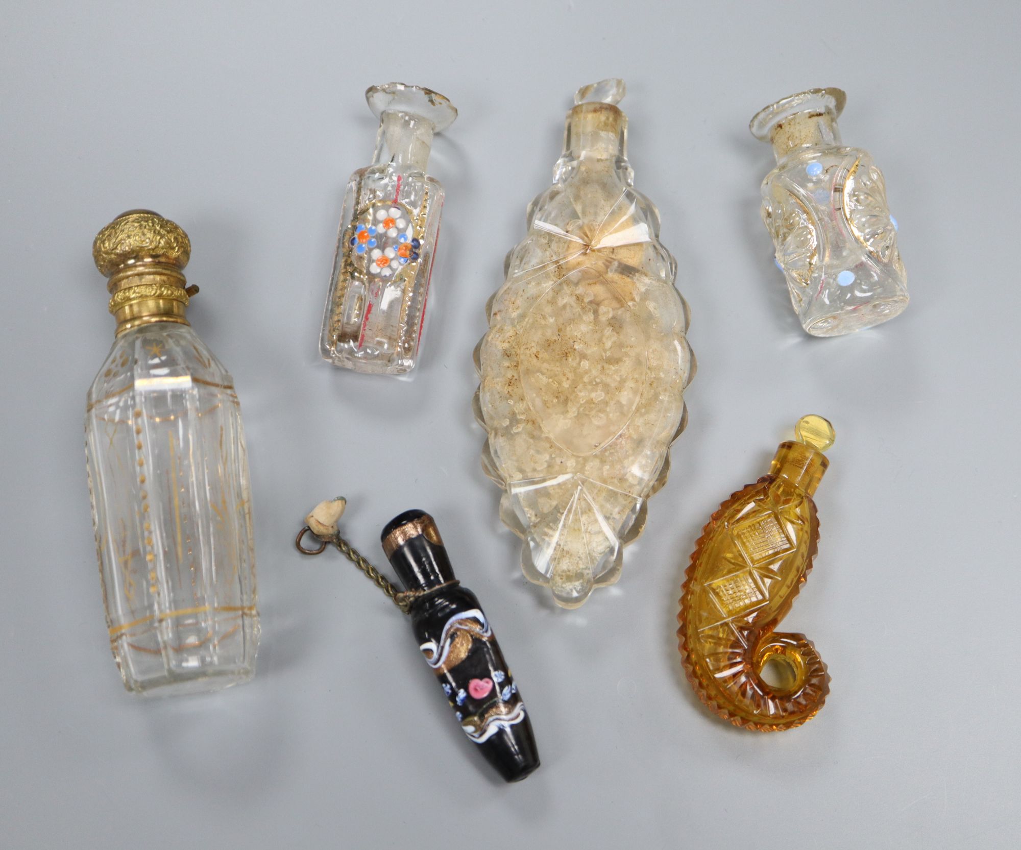 Six assorted glass scent bottles